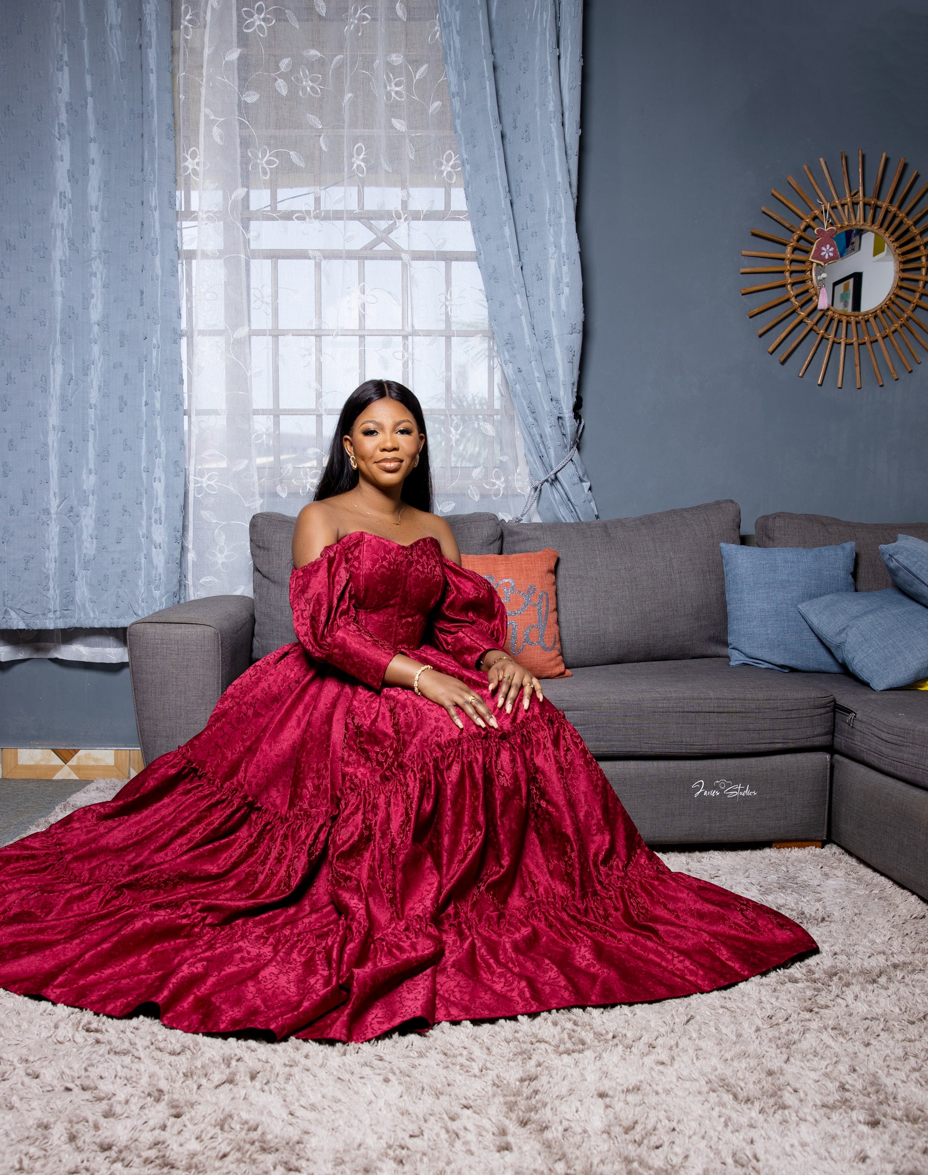 Portrait in a burgundy gown by Javies Photography Studio